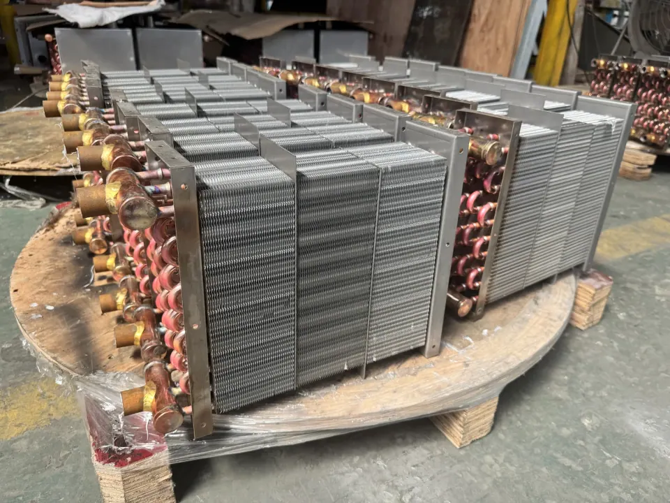 Compact copper-tube finned evaporator cores in factory production
