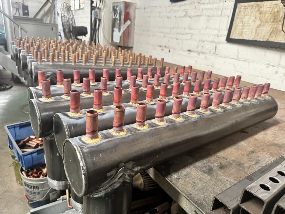 Heat exchanger header fabrication